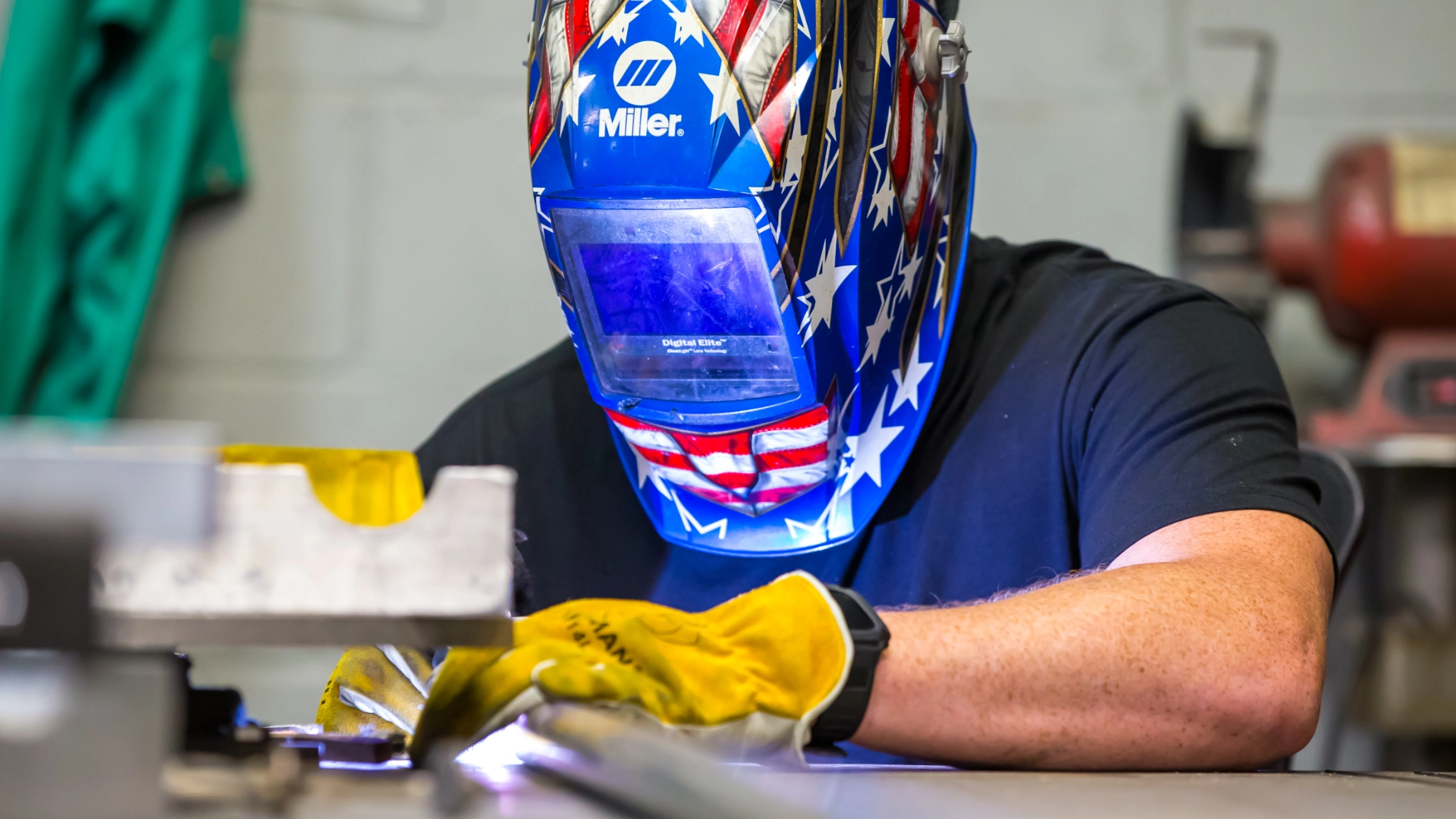 A photo of a Bergan technician working on some equipment.